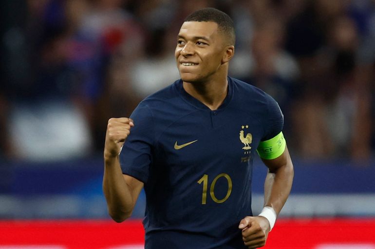 France's Kylian Mbappe celebrates scoring their first goal