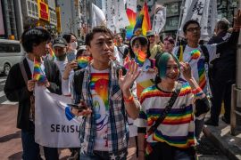 Campaigners are fighting against claims that alternatives to marriage offer LGBTQ people equal rights [File: Yuichi Yamazaki/AFP]