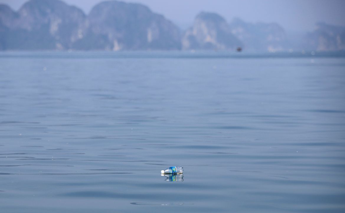 a plastic bottle floating in Ha Long Bay