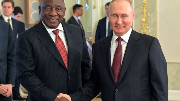 This handout picture taken by RIA Novosti on June 17, 2023 shows Russian President Vladimir Putin (R) shaking hands with South Africa's President Cyril Ramaphosa (L) following a meeting with delegation of African leaders at the Constantine (Konstantinovsky) Palace in Strelna, outside Saint Petersburg.