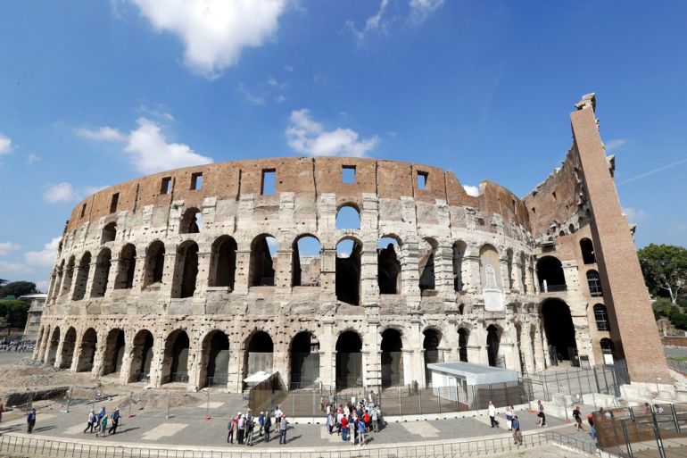 Tourists are seen visiting the ancient Colosseum, in Rome, Tuesday, Oct. 3, 2017. Officials on Tuesday showed off the newly restored fourth and fifth levels of the Colosseum, which are opening to the public starting Nov. 1. Included in the tour is a connecting hallway that has never before been open to tourists. (AP Photo/Andrew Medichini)