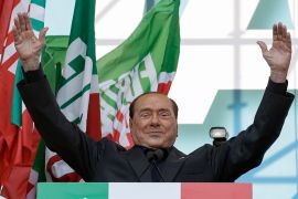 Silvio Berlusconi addresses a rally in Rome, on October 19, 2019 [File: Andrew Medichini/AP]