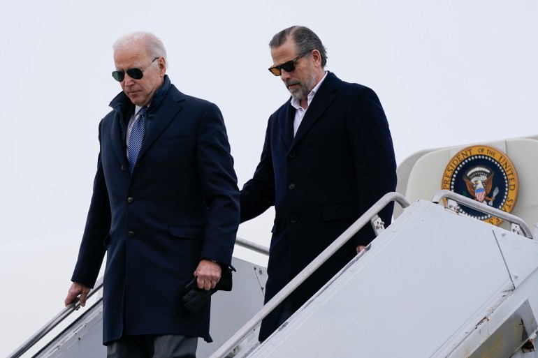 US President Joe Biden and his son Hunter Biden step off Air Force One