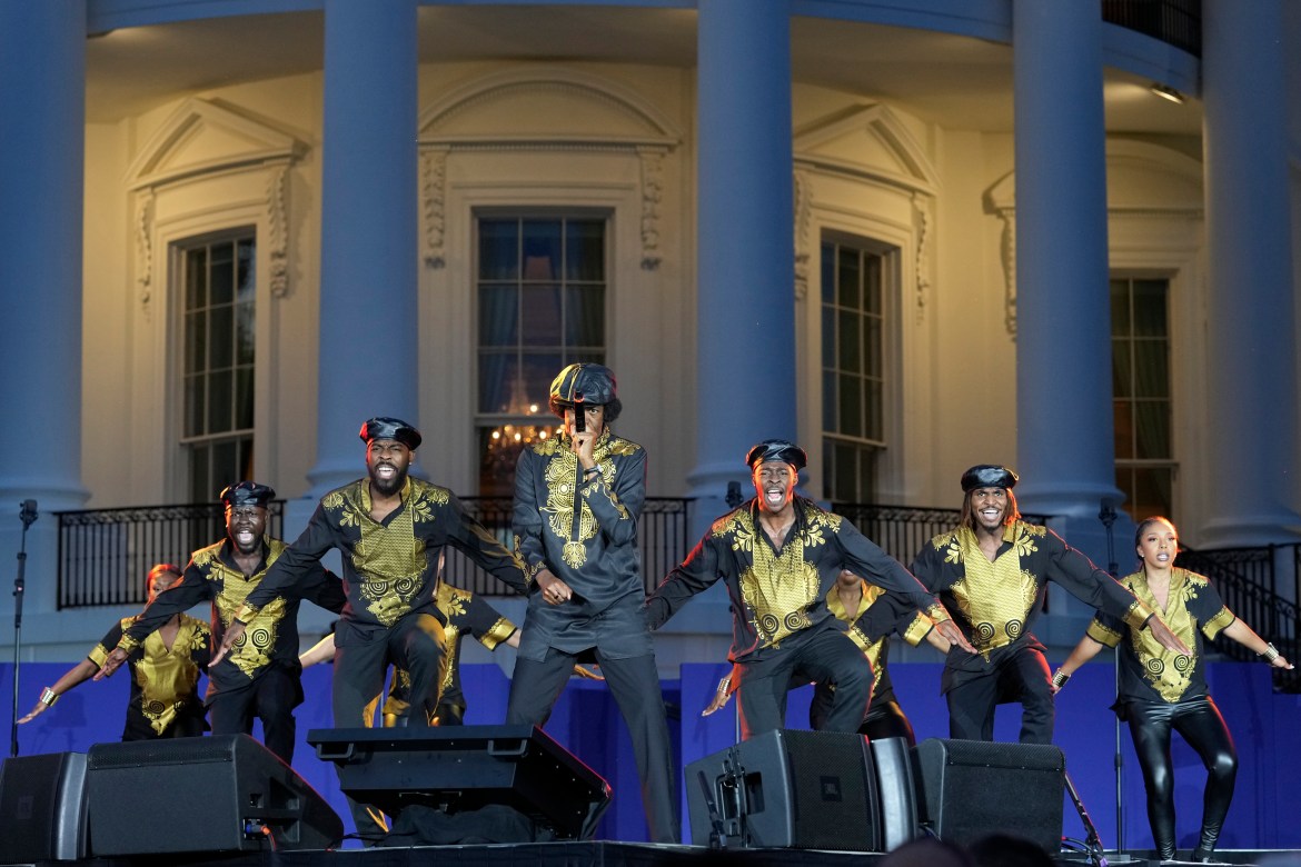 Step Afrika! performs during a Juneteenth concert