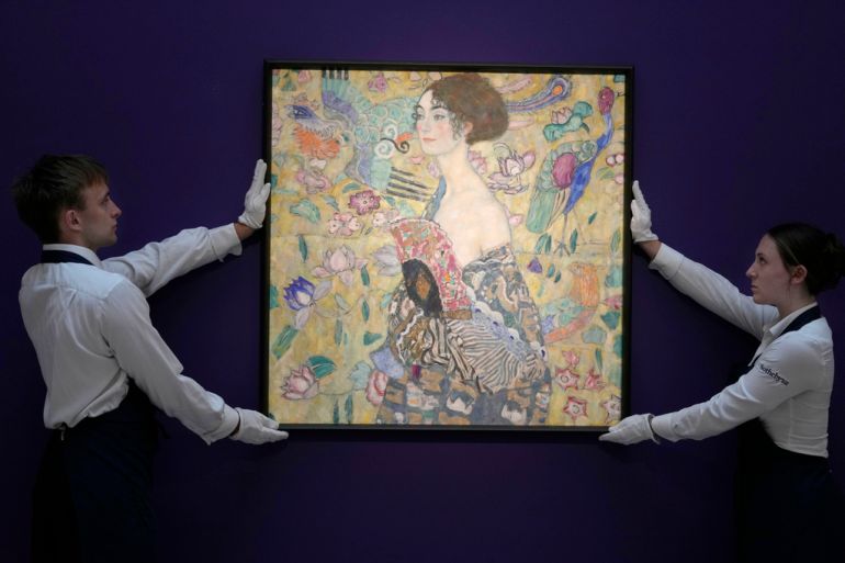 Gustav Klimt's 'Dame mit Faecher' (Lady with a Fan) is displayed at Sotheby's auction room