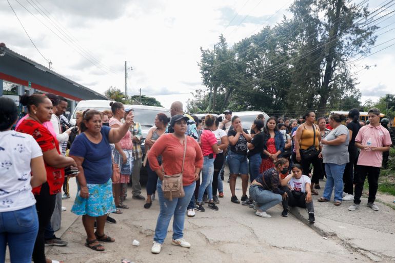 Families crowd outside of a prison in Honduras
