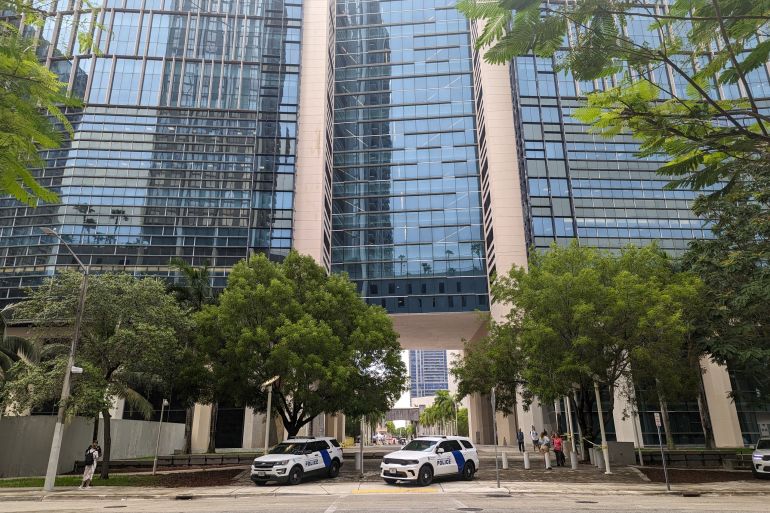 Cars parked outside the federal courthouse in Miami