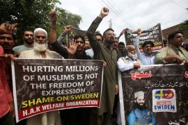 epa10730363 Pakistani traders shout slogans as they attend a protest against the burning of a copy of the Koran in Sweden, in Peshawar, Pakistan, 06 July 2023