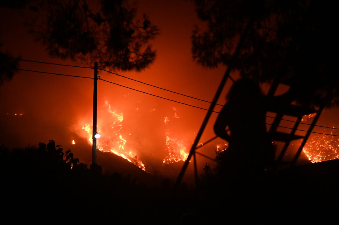 A wildfire burns at the Trapeza village, in Achaia Peloponnese, Greece