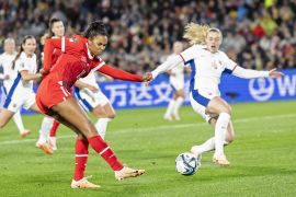 Switzerland's Coumba Sow (L) and Mathilde Harviken (R) of Norway in action