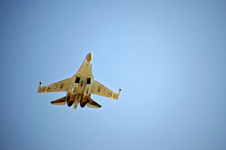 A Russian air force Sukhoi Su-35 fighter takes off at the Russian military base of Hmeimim, located south-east of the city of Latakia in Hmeimim, Latakia Governorate, Syria, on September 26, 2019. - With military backing from Russia, President Bashar al-Assad's forces have retaken large parts of Syria from rebels and jihadists since 2015, and now control around 60 percent of the country. Russia often refers to troops it deployed in Syria as military advisers even though its forces and warplanes are also directly involved in battles against jihadists and other rebels (Photo by Maxime POPOV / AFP)