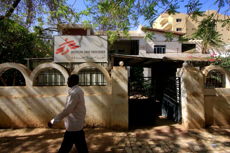 A man walks past the medical charity Medecins Sans Frontieres (MSF)