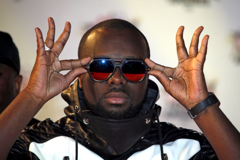 Congolese rapper Maitre Gims arrives for the NRJ Music Awards ceremony at the Festival Palace in Cannes
