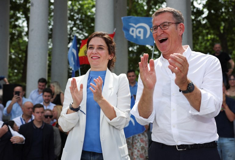 Spain's opposition and People's Party (PP) leader Alberto Nunez Feijoo and the President of the Community of Madrid, Isabel Diaz Ayuso