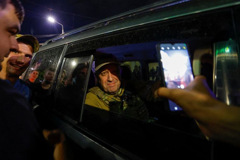 Wagner mercenary chief Yevgeny Prigozhin leaves the headquarters of the Southern Military District amid the group's pullout from the city of Rostov-on-Don, Russia.