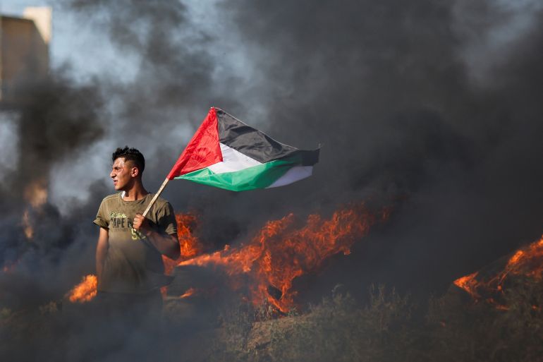 Palestinians protest against Israeli army raid in Jenin, along Israel-Gaza border fence