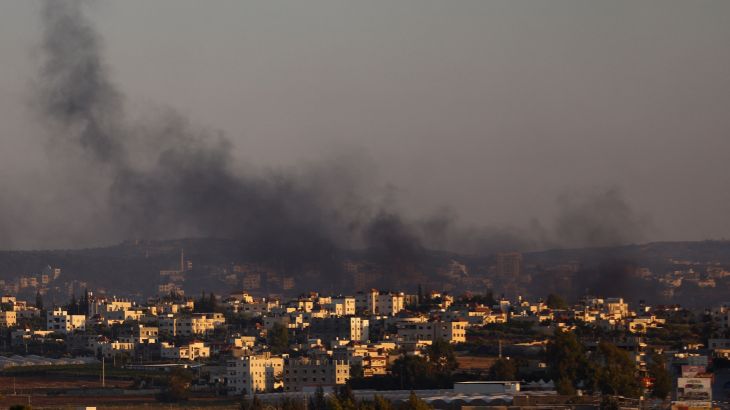 Smoke is seen from Israel's side during a raid on Jenin refugee camp in the Israeli-occupied West Bank