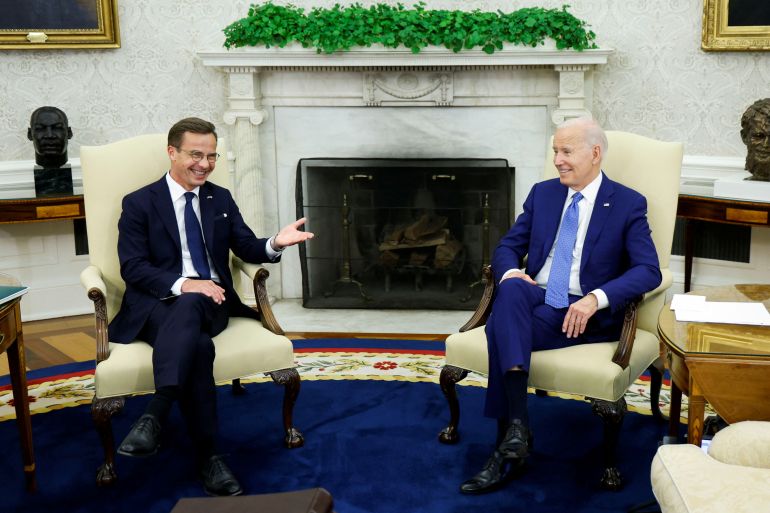 Joe Biden sits with Ulf Kristersson in the Oval Office