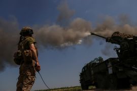 FILE PHOTO: A Ukrainian serviceman of the 57th Kost Hordiienko Separate Motorised Infantry Brigade fires a 2S22 Bohdana self-propelled howitzer towards Russian troops, amid Russia's attack on Ukraine, at a position near the city of Bakhmut in Donetsk region, Ukraine July 5, 2023. REUTERS/Sofiia Gatilova/File Photo