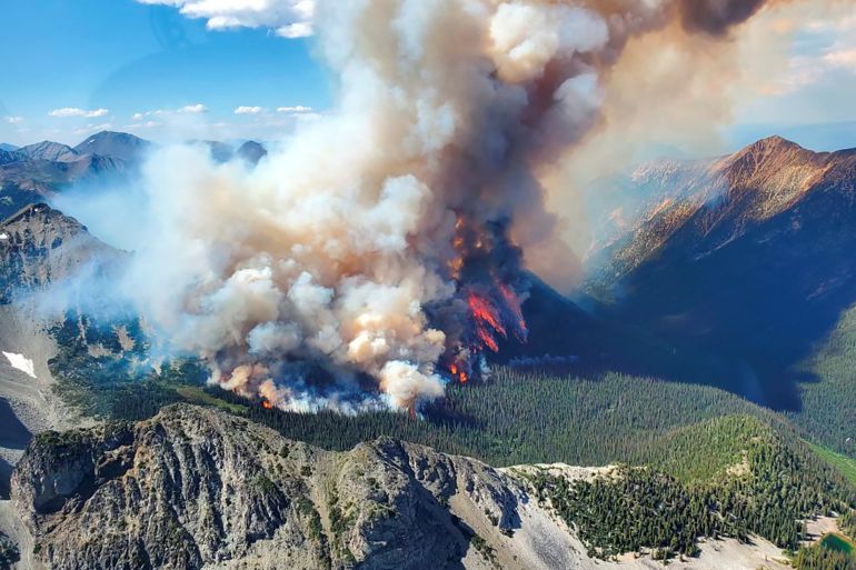 Smoke rises from a wildfire in BC, Canada