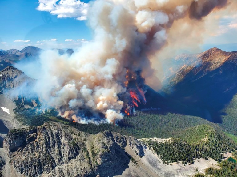 Smoke rises from a wildfire in BC, Canada