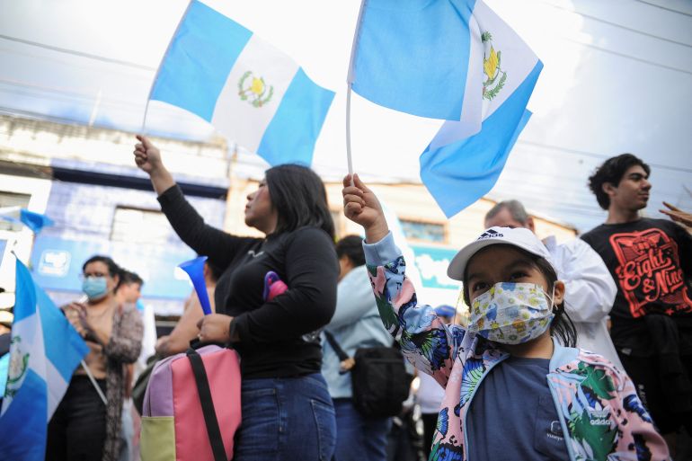 Protesters wave Guatemalan flags