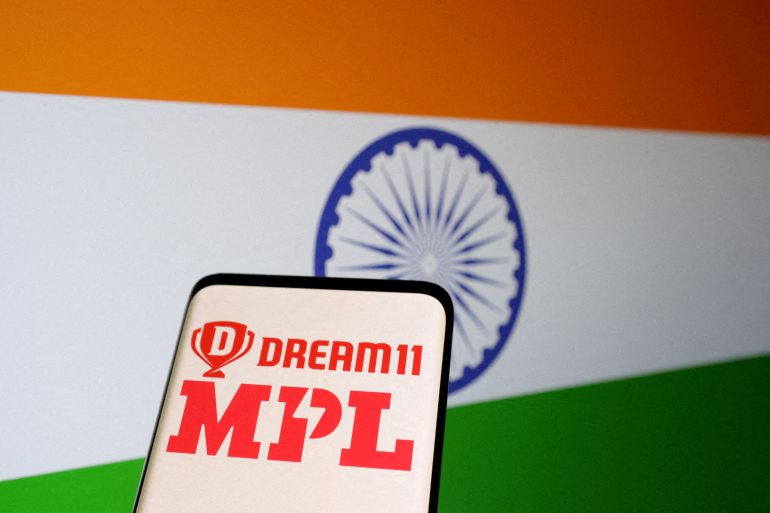 Dream11 and MPL logos are displayed in front of the Indian flag in this Illustration