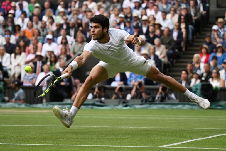 Tennis - Wimbledon - All England Lawn Tennis and Croquet Club, London, Britain - July 16, 2023 Spain's Carlos Alcaraz in action during his final match against Serbia's Novak Djokovic REUTERS/Dylan Martinez