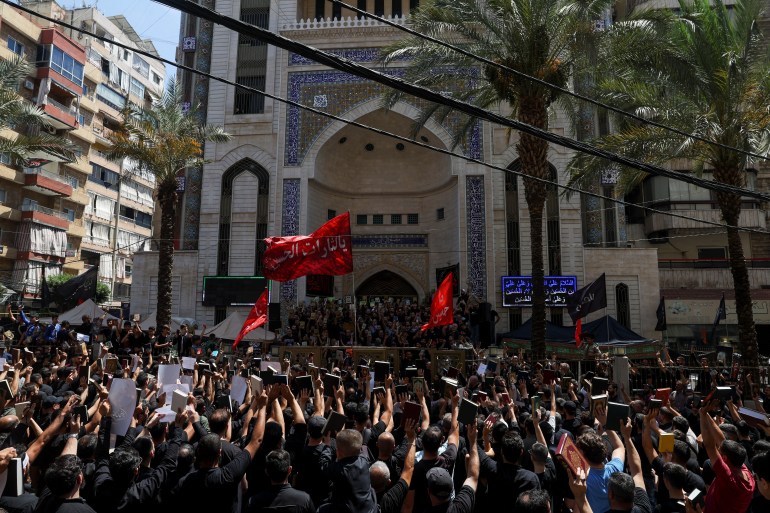 Lebanese Muslims participate in a demonstration called by the Shi'ite group Hezbollah