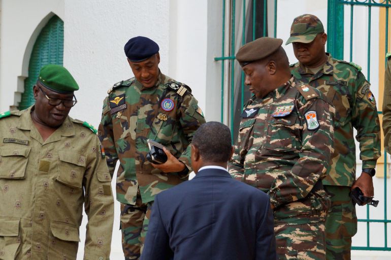 General Abdourahmane Tchiani, who was declared as the new head of state of Niger by leaders of a coup, arrives to meet with ministers in Niamey, Niger