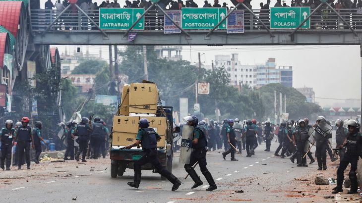 Policemen disperse the supporters of the Bangladesh Nationalist Party (BNP)