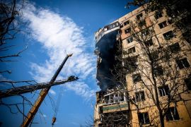 A view shows an apartment building heavily damaged by a Russian missile strike, amid Russia's attack on Ukraine, in Kryvyi Rih