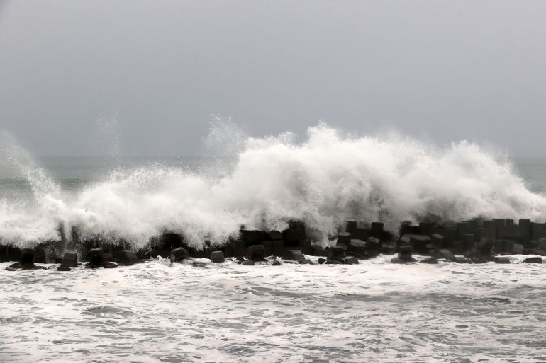 Sea waves are pictured near the coast in Linbian in western Pingtung County on July 26, 2023, as Typhoon Doksuri past southern Taiwan. - High waves lashed Taiwan's southeastern coast on July 26, with the Central Weather Bureau issuing warnings and heavy rain advisories. (Photo by Johnson LIU / AFP)