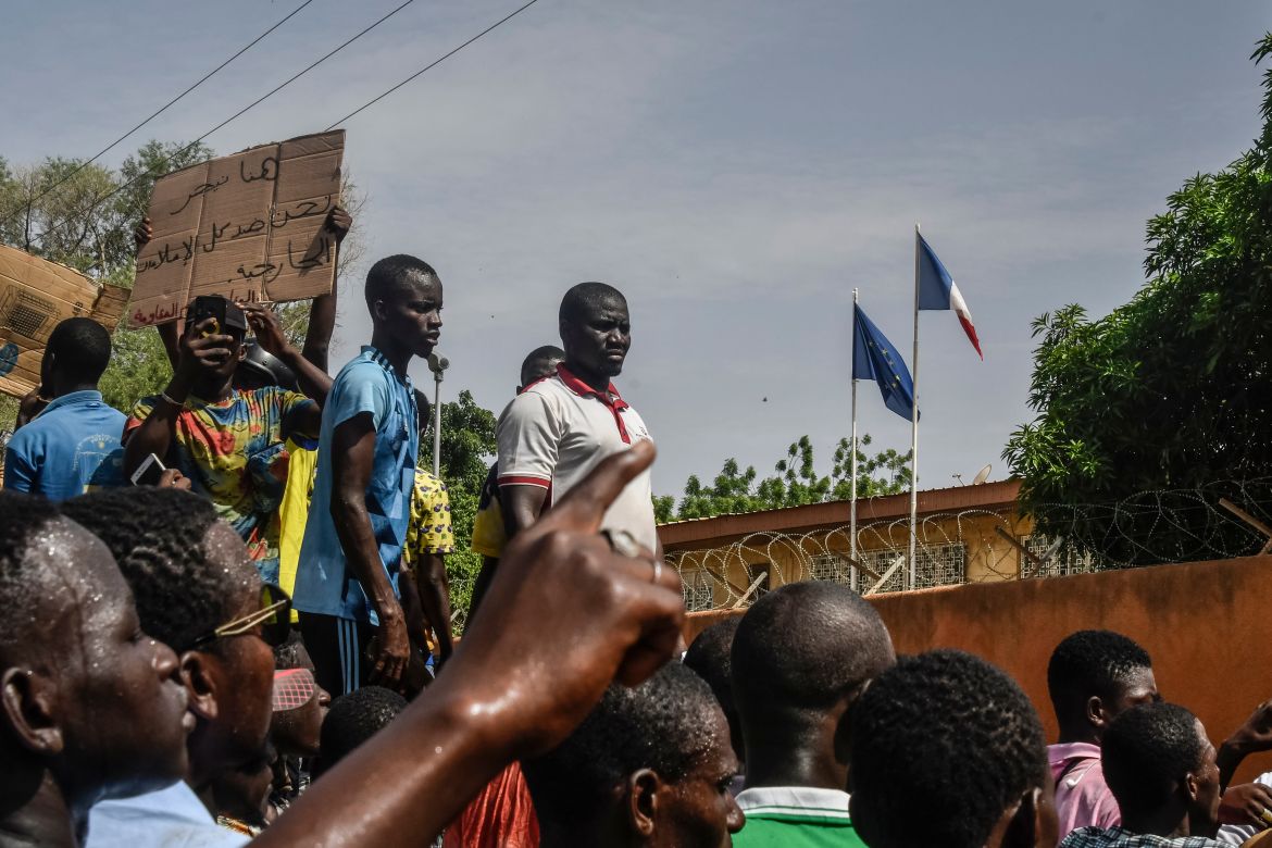 Protesters gather in front of the French Embassy in Niamey