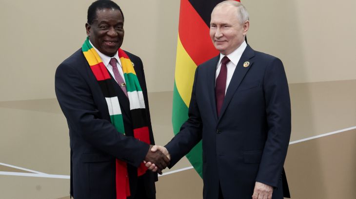 Russian President Vladimir Putin meets with his Zimbabwe counterpart Emmerson Mnangagwa during the second Russia-Africa summit in Saint Petersburg on July 27, 2023. (Photo by Vyacheslav PROKOFYEV / TASS Host Photo Agency / AFP) / RESTRICTED TO EDITORIAL USE - MANDATORY CREDIT "AFP PHOTO / TASS HOST PHOTO AGENCY / VYACHESLAV PROKOFYEV" - NO MARKETING NO ADVERTISING CAMPAIGNS - DISTRIBUTED AS A SERVICE TO CLIENTS - RESTRICTED TO EDITORIAL USE - MANDATORY CREDIT "AFP PHOTO / TASS Host Photo Agency / Vyacheslav Prokofyev" - NO MARKETING NO ADVERTISING CAMPAIGNS - DISTRIBUTED AS A SERVICE TO CLIENTS /