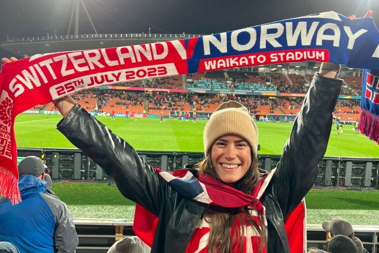 Norway fan holds ip Norway vs Switzerland flag