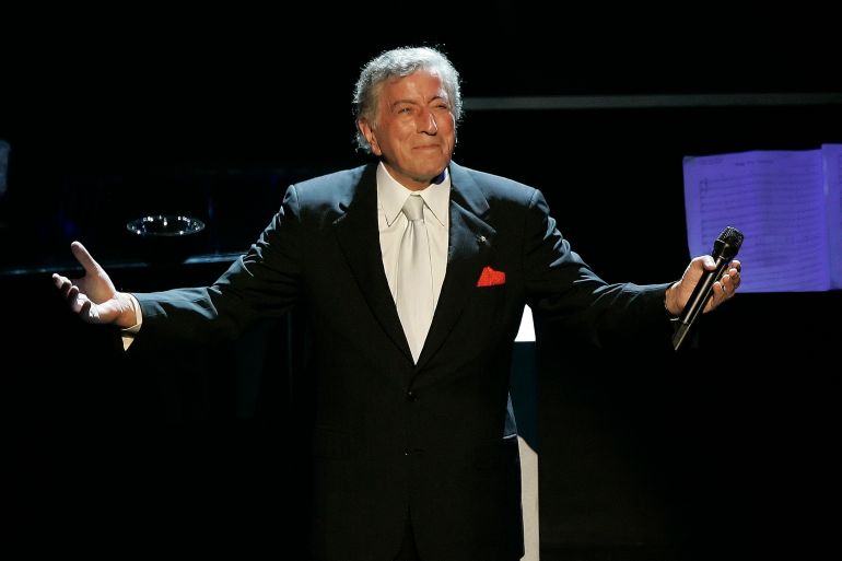 Tony Bennett reacts after performing the song "I left My Heart in San Francisco" during his 80th birthday celebration at the Kodak Theater in Los Angeles