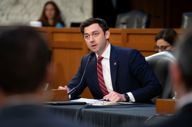 Sen. Jon Ossoff, D-Ga., questions Attorney General Merrick Garland during a Senate Judiciary Committee hearing examining the Department of Justice, at the Capitol in Washington, Wednesday, March 1, 2023.