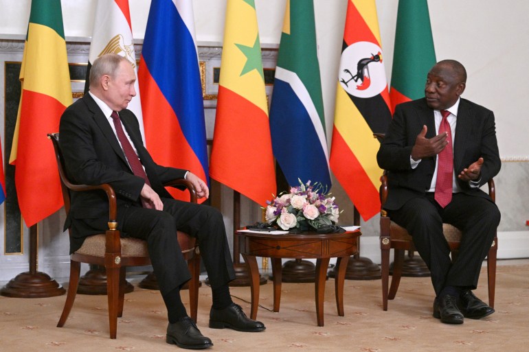 In this handout photo provided by Photo host Agency RIA Novosti, Russian President Vladimir Putin, left, listens to South African President Cyril Ramaphosa during their talks after a meeting with a delegation of African leaders and senior officials in St. Petersburg, Russia, Saturday, June 17, 2023. Seven African leaders — presidents of Comoros, Senegal, South Africa and Zambia, as well as Egypt's prime minister and top envoys from the Republic of Congo and Uganda — traveled to Russia on Saturday a day after visiting Ukraine on a mission to try to help end the hostilities. (Ramil Sitdikov/Photo host Agency RIA Novosti via AP)