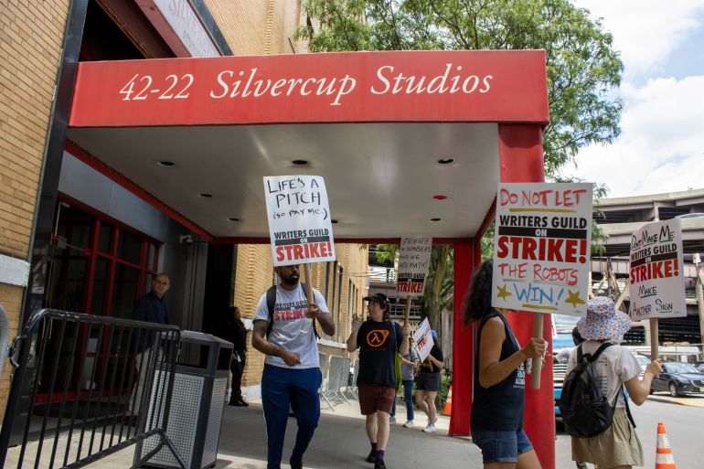 Film and TV writers and their supporters picket at the Silvercup Studios production facilities in the Queens borough of New York