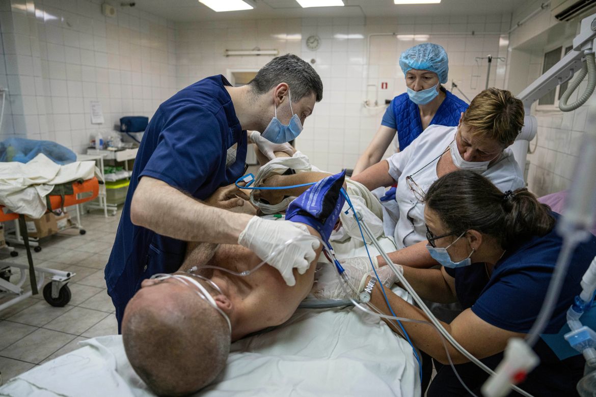 Medical staff treat a seriously wounded Ukrainian serviceman