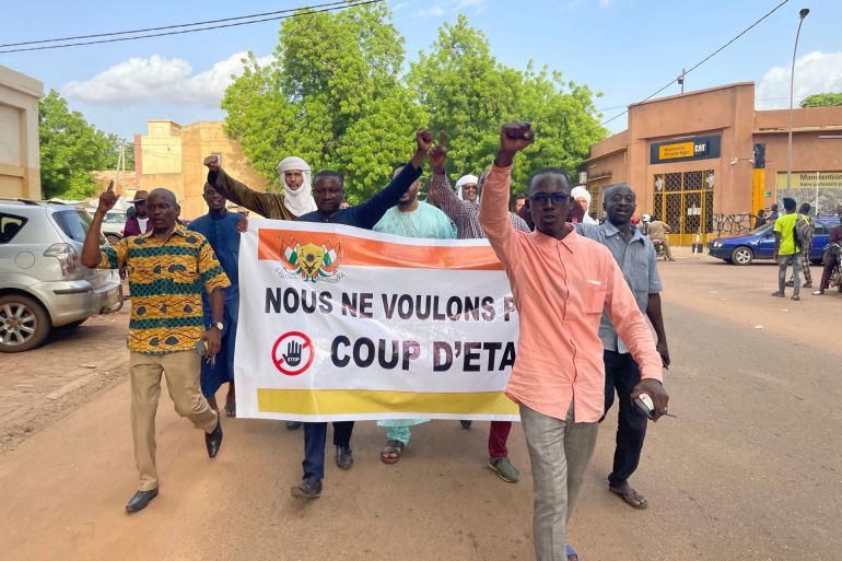 Supporters of Nigerien President Mohamed Bazoum demonstrate in his support in Niamey, Niger, Wednesday July 26, 2023.
