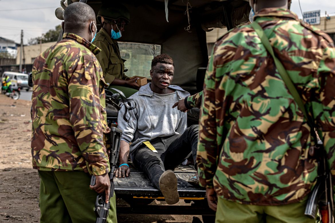 kenya15: A man is arrested after allegedly posing as a protester and engaging in looting at a market near Shauri Moyo, Nairobi. Previous anti-government protests have escalated into widespread robberies, arson, and damage to property.