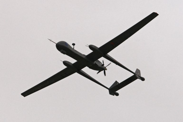 A Heron TP, also known as the IAI Eitan, surveillance unmanned air vehicle (UAV) flies during an official inauguration ceremony at Tel Nof Air Force Base near Tel Aviv.