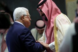 Saudi Arabia&#39;s Crown Prince Mohammed bin Salman, right, greets PA President Mahmoud Abbas before the start of the 29th Arab Summit in Dhahran, Saudi Arabia, April 15, 2018 [Hamad I Mohammed/Reuters]