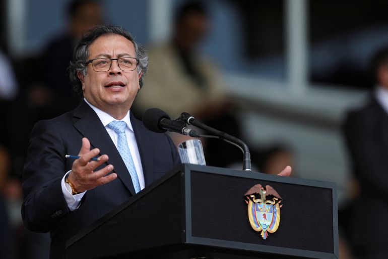 Colombian President Gustavo Petro speaks at a podium