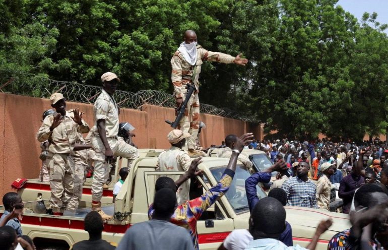 Nigerien security forces prepare to disperse pro-coup demonstrators gathered outside the French embassy, in Niamey, the capital city of Niger July 30, 2023