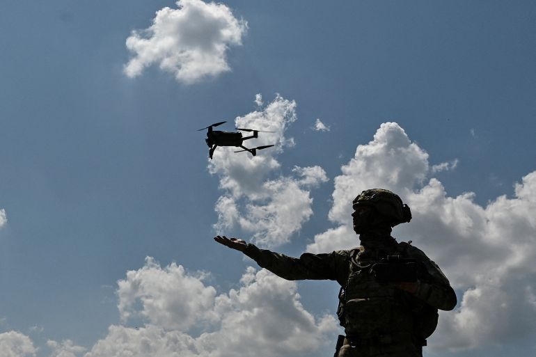 A Ukrainian serviceman of 108th separate territorial defence brigade of the Armed Forces of Ukraine launches a drone near a frontline, amid Russia's attack on Ukraine, in Zaporizhzhia region, Ukraine August 4, 2023. REUTERS/Stringer TPX IMAGES OF THE DAY
