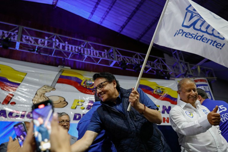 Ecuadorean presidential candidate Fernando Villavicencio greets supporters as he attends a rally in Quito, Ecuador August 9, 2023. REUTERS/Karen Toro
