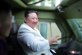 North Korean leader Kim Jong Un visits a key military factory in this undated photo released by North Korea's Korean Central News Agency (KCNA) on August 14, 2023.